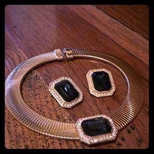 Gold tone necklace with matching clip on earrings